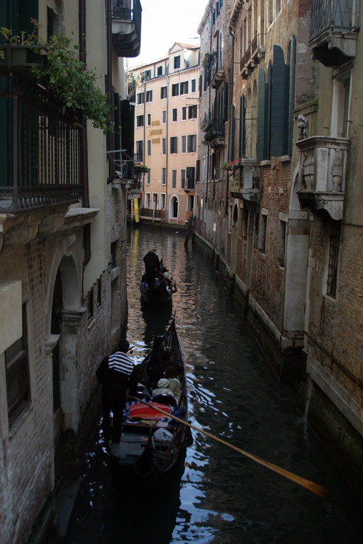 Gondolas in narrow canal